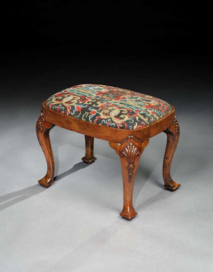 A George I walnut stool